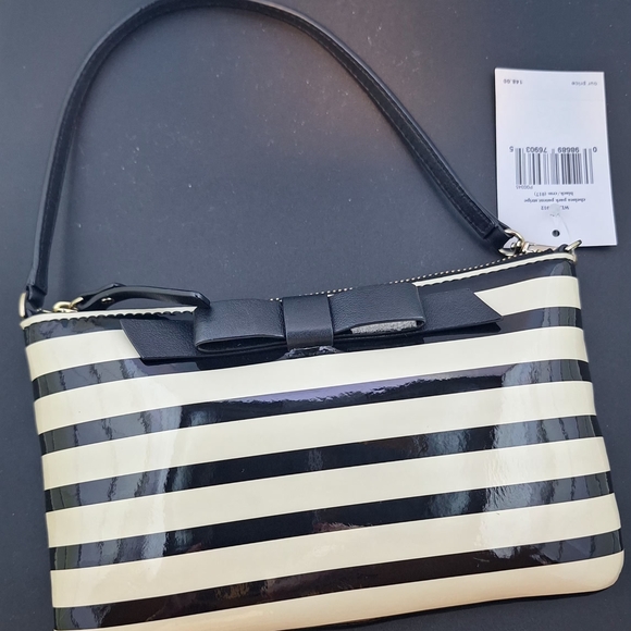 kate spade Handbags - Kate Spade Black and Cream Striped Clutch